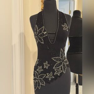Hand beaded Black Halter made on stretch quality fabric. Brand new with tags.